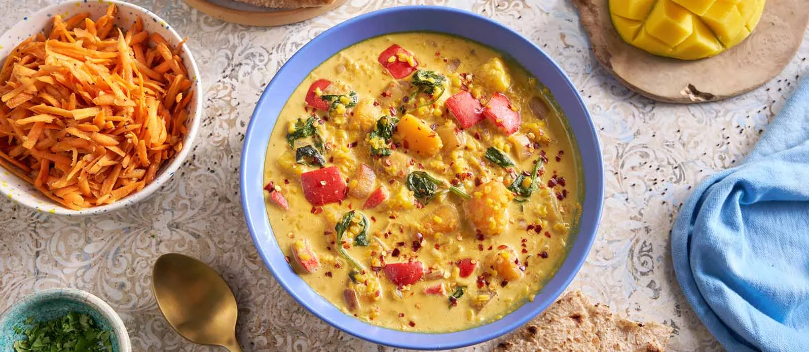 Moong-dal med græskar, mango og kokos